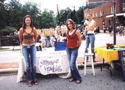 Selling their wares at the College Hill festival ()