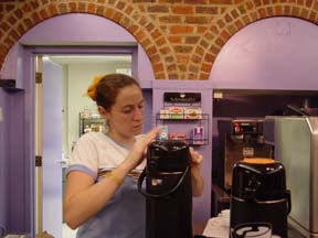 Vanessa McGreevy sets up coffee for the co-op ()