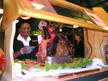 Sodexho worker serves roast beef in the cafeteria (Maggie Bamberg/Guilfordian)