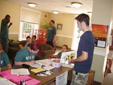 Students check in for housing in Milner Lounge ()