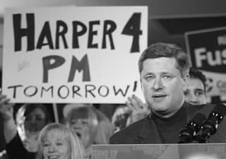 Stephen Harper speaks at the rally on the eve of his election ()