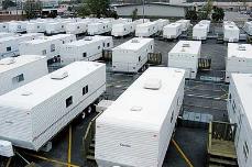 Many displaced residents live in FEMA-provided trailers. (ecoenquirer.com)