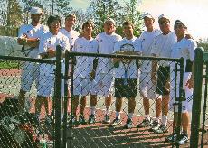 The men's tennis team (left to right): Mike Muir, Ryo Kawai, Patrick Childs, Will Mason-Deese, Kellan Schollaert, Jose Oritz, Alec Chase, Coach Bert Poole, and Caleb Kimbrough. ()