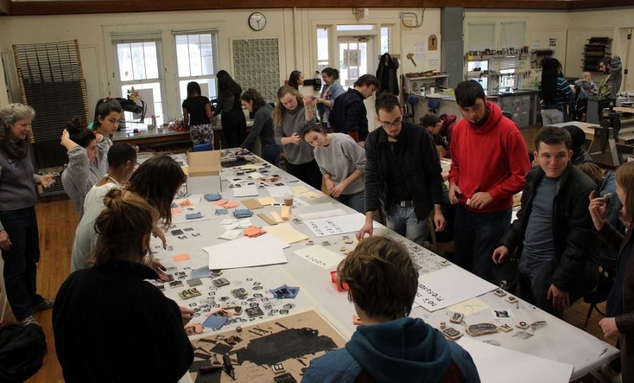 Faculty and students gather in the Hege Cox print shop during the Free Press event on Friday afternoon, Feb. 10, 2017. At least 100 student and faculty participated in the print-making open house. They printed T-shirts, posters and stickers with Black Lives Matter and Feminism is for Everyone. Photo by Julia Martins De Sa/Copyright 2017