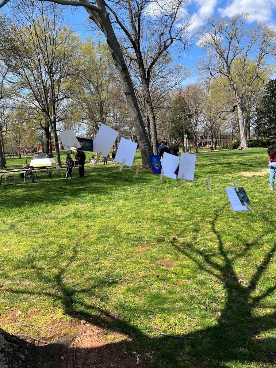 Tarot cards were used as inspiration or prompts for stories written by students who visited the Greenleaf Review’s table. The stories were written on notecards, then strung onto a piece of twine tied between a nearby tree and the table.