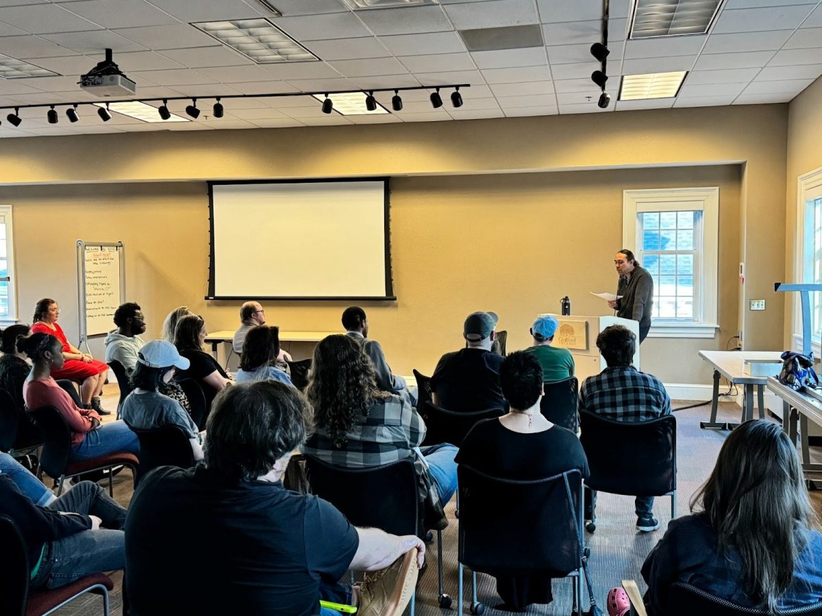 Poet Shawn Delgado, who teaches at Guilford and UNCG, engaged the audience at his spring reading with poems that covered a range of topics. 
