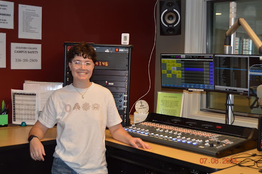 WQFS general manager Bec Cormack, happy to see the renovations finally finished, proudly stands next to the radio’s new console. 