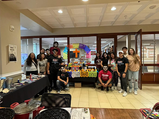 Hispanos Unidos de Guilford members celebrate Dia de Los Muertos and showcase togetherness in club events. 